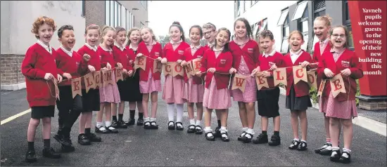  ?? PHOTO: BLAKE EZRA ?? Yavneh pupils welcome guests to the opening of their new building this month