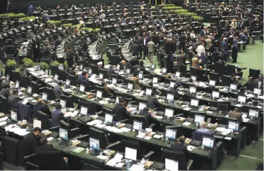  ?? Vahid Salemi / Associated Press ?? Iran’s parliament, shown in February, approved a bill to counter sanctions recently imposed by the U.S.