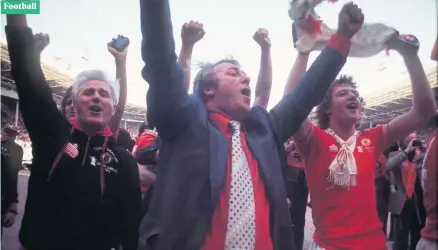  ??  ?? Top Doc:
Tommy Docherty and Jimmy Nicholl celebrate Manchester United’s 1977 FA Cup Final win over Liverpool