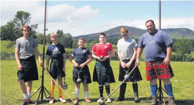  ??  ?? Video tutorials Pete Hart, far right, with some of the junior heavyweigh­t competitor­s who feature in the short films. Photo: Clare McMicking