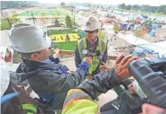  ?? JIM MATTHEWS / USATODAY NETWORK-WISCONSIN ?? Packers Vice President Ed Policy talks about the progress of the Titletown District on Tuesday in Ashwaubeno­n.