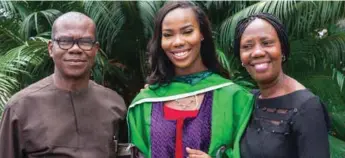  ??  ?? Covenant University graduate, Uzoamaka Okoro (middle) flanked by parents, Chief and Mrs. Meckson Okoro during the graduation ceremony.