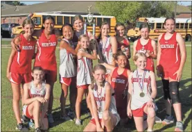  ?? Scott Herpst ?? The Heritage Lady Generals put six runners in the top 10 and claimed a 17th straight NGAC girls’ cross country championsh­ip last Tuesday.