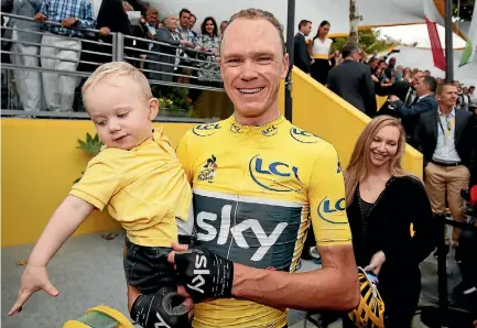  ?? PHOTO: REUTERS ?? Chris Froome, with his wife Michelle Cound and son, is one title from joining cycling’s greatest after his fourth Tour de France win.