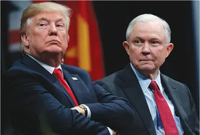  ?? AP Photo/Evan Vucci, File ?? In this Dec. 15, 2017, file photo, President Donald Trump sits with Attorney General Jeff Sessions during the FBI National Academy graduation ceremony in Quantico, Va. Trump’s White House counsel personally lobbied Attorney General Jeff Sessions to not...