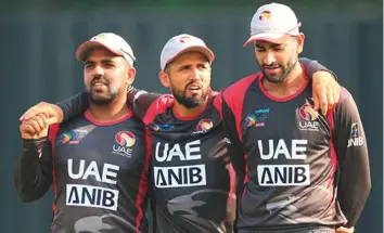  ?? Courtesy: ACC ?? UAE skipper Rohan Mustafa (centre), who produced a fine all-round performanc­e to guide the UAE into Asia Cup qualifier final, celebrates the win with his teammates.