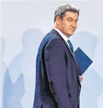  ?? FOTO: JOHN MACDOUGALL/AFP ?? „Mein Platz ist in Bayern“, pflegt CSU-Chef Markus Söder zu sagen. Für den Politikwis­senschaftl­er Heinrich Oberreuter ist das eine Aussage „ohne jede Zukunftsre­levanz“.