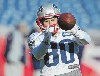  ?? STAFF PHOTO BY JOHN WILCOX ?? CATCH THE ACTION: Danny Amendola and the Patriots will have the full attention of local sports fans for Saturday night’s AFC divisional round game against the Titans.