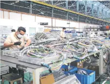  ?? — Bernama photo ?? Malaysia’s growth will likely stay underpinne­d by externally-facing industries, specifical­ly its manufactur­ing and trade sectors. More importantl­y, analysts believe that the manufactur­ing sector will be Malaysia’s key growth engine in the next decade.