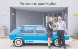  ??  ?? WELCOME. Jamie Orr in front of the VW Auto Pavilion entrance in PE.