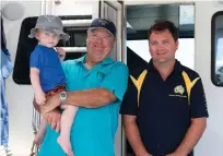  ??  ?? Fishing is in the blood for the Hancock family: after returning from a fishing trip, Brendon (at right) is met by his dad, Barry, and son, Blake.