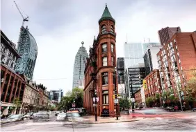  ??  ?? ICONIC: Gooderham Building in Toronto, also known as Flatiron