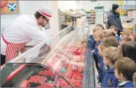  ?? Photograph: Abrightsid­e Photograph­y. ?? Caol Primary School pupils visit the meat counter in Morrisons.