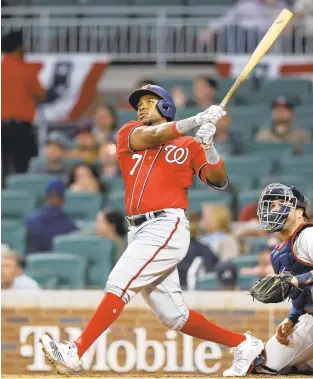  ?? TODD KIRKLAND/GETTY ?? Washington’s Maikel Franco hits a two-run homer in the third inning of Monday night’s game against the Atlanta Braves.