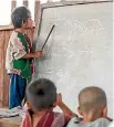  ??  ?? Kunu’s school is a hub for the community and families returning to the village in Myanmar’s jungle.