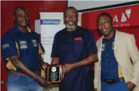  ??  ?? L-R: Chairman, Board of Directors, Draiklinas Limited, Dr. Tunde Ayeye; Pionner Staff and long serving Staff, Mr. Sina Ogunbona and the Country Manager, Mr. Afolabi Abraham, during the event