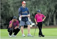  ?? [ AFP Getty North America] ?? Im Team-Look beim Family-Hit in Orlando: Tiger und Charlie Woods.