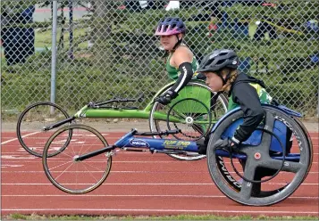  ?? STEVEN MAH/SOUTHWEST BOOSTER ?? Madison Lawrence (left) edged teammate Ayva Delainey for bronze in the 100 Metre Para Sport Race on Saturday.