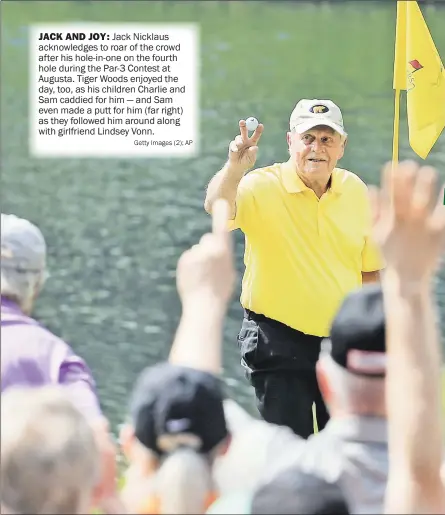  ??  ?? Jack Nicklaus acknowledg­es to roar of the crowd after his hole- in- one on the fourth hole during the Par- 3 Contest at Augusta. Tiger Woods enjoyed the day, too, as his children Charlie and Sam caddied for him — and Sam even made a putt for him ( far...