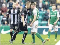  ??  ?? Andy Geggan and Hibs’ Lewis Stevenson square up to each other.