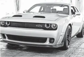  ?? KIMBERLY P. MITCHELL/USA TODAY NETWORK ?? The new 2019 Dodge Challenger SRT Hellcat Redeye can consume a tank full of gas in under 11 minutes at full throttle.