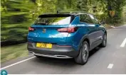  ??  ?? Vauxhll atylists have made a spirited attempt at superimpos­ing Astra curves on to a Peugeot