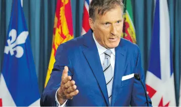  ?? ADRIAN WYLD / THE CANADIAN PRESS ?? Maxime Bernier announces he is leaving the Tory party in Ottawa on Thursday, on the eve of the party convention.