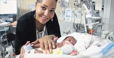  ?? PHOTOS: MONICA HERNDON TNS ?? Left: Elisha Creighton of Dade City with her daughter Matayah at Tampa General Hospital. She was born on March 16 at 24 weeks old. Each NICU room has a webcam so family can watch from afar. Creighton said that’s helped with her breast milk production....