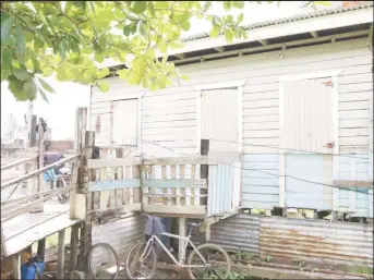  ??  ?? This is Pamela London’s home. At the top of the landing is her non-functional wheelchair.