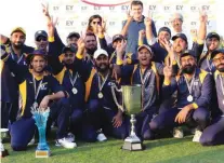  ?? – Supplied Photo ?? ALL SMILES: The winners of the EY Inter-company Mena Cup Alkhobar pose with the trophy.