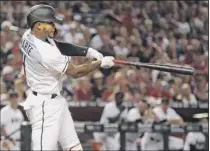  ?? Christian Petersen / Getty images ?? Arizona’s Ketel marte hit a grand slam and finished with a career-high five rbis in the win.