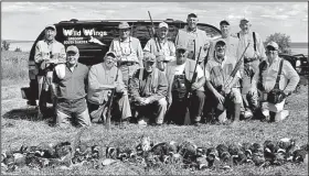  ?? Arkansas Democrat-Gazette/BRYAN HENDRICKS ?? A group of Arkansans enjoyed an excellent pheasant hunt Sept. 20-22 near Gregory, S.D. The group included, from left, back row, John Logan, Greg Graham, Ed Harshman, Skip Henry, Jerry Lovelace and Bill Wilson. Front row, from left, Lance Miller, Joe Thomas, David Burnett, Monty Davenport, James Riddle and Bryan Hendricks.