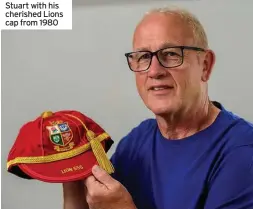  ??  ?? Stuart with his cherished Lions cap from 1980