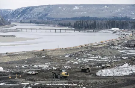  ??  ?? The Site C dam along the Peace River near Fort St. John is under constructi­on in this April photo.