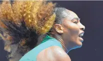  ?? PAUL CROCK/GETTY IMAGES ?? Serena Williams serves in a 6-0, 6-2 win vs. Germany's Tatjana Maria.