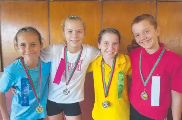  ??  ?? FAB FOUR: Winners in the 12-year category were Olivia Boase (first), Madison Wilkinson (second), Zara Stevens (third) and Layla Geck (fourth).