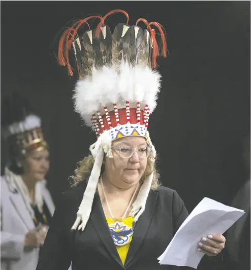  ?? ADRIAN WYLD / THE CANADIAN PRESS ?? National Chief of the Assembly of First Nations Cindy Woodhouse Nepinak had her headdress, which was stored in a case at the time, removed from the cabin and placed in a plastic bag during her recent Air Canada flight.