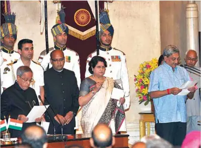  ??  ?? The President of India Pranab Mukherjee administer­ing the oath as Cabinet Minister to Manohar Parrikar, at a
swearing-in ceremony, at Rashtrapat­i Bhavan, in New Delhi on November 9, 2014