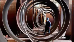  ??  ?? A worker in a factory which exports offshore wind power technology at Taicang Economic and Technical Developmen­t Zone, Jiangsu Province, February 8, 2021