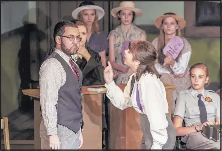  ?? PHOTOS BY JASON R. TERRELL ?? Defense attorney Helen Drummond (right) (Gabby Valasquez) challenges the beliefs of Matthew Harrison Brady (Ben Chappell) in “Inherit the Wind.”