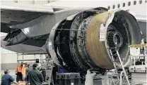  ?? PHOTO: VIA REUTERS ?? Damaged . . . The problemati­c starboard engine of United Airlines flight 328, a Boeing 777200, is seen in a hangar at Denver Internatio­nal Airport yesterday.