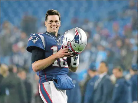  ?? ELISE AMENDOLA/AP FILE PHOTO ?? New England Patriots quarterbac­k Tom Brady warms up before an NFL wild-card playoff football game against the Tennessee Titans on Jan. 4 in Foxborough, Mass. The 42-year-old quarterbac­k with six Super Bowl rings said Tuesday morning that he is leaving the New England Patriots and is expected to sign a free agent contract with the Tampa Bay Buccaneers.