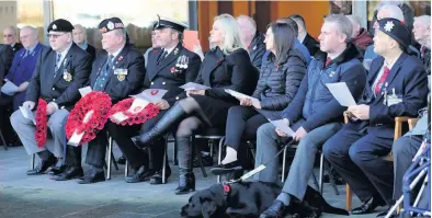  ??  ?? Moving words Laurence Binyon’s poem For the Fallen was read out at the memorial