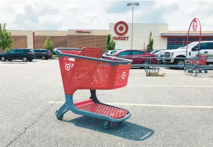  ?? BILL SIKES/AP ?? Cart Narcs’ videos document the work of “agents” who patrol store parking lots to admonish people who randomly dump their shopping carts instead of returning them to the proper corrals.