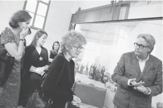  ?? The Associated Press/Files ?? Members of the Irving Berlin family view exhibits at the Red Star Line museum in Antwerp, Belgium.