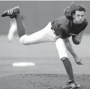  ?? [OKLAHOMAN ARCHIVES] ?? Tulsa Union's Drew Rucinski loses his hat on a pitch during the Oklahoma All-State baseball game in 2007 at Bricktown Ballpark.