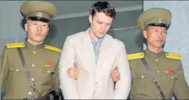  ?? REUTERS FILE ?? Otto Frederick Warmbier (centre) being taken to North Korea's top court in Pyongyang.