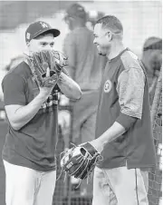  ?? Karen Warren / Houston Chronicle ?? Alex Cintron, right, will exchange being the Astros’ translator for serving as first-base coach.