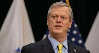  ?? Pool File photo ?? IN PLACE: Gov. Charlie Baker, who’s older than Walsh, chose not to go early for his vaccinatio­n.