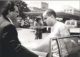  ?? LAPD OFFICIALS ESCORT Rick Meyer Los Angeles Times ?? Robert Bardo near Parker Center in downtown L.A. in August 1989, a month after Bardo killed actress Rebecca Schaeffer, 21.